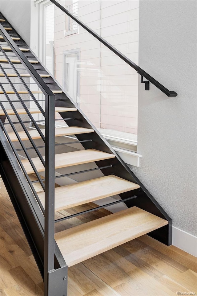 3156 W 20th Ave, Denver, CO 80211 - stairway with a textured wall and wood finished floors