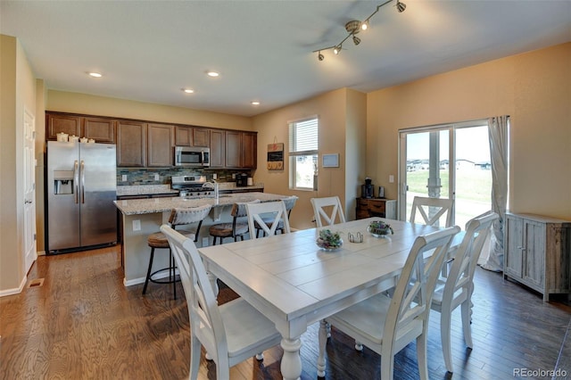 5837 High Timber Cir, Castle Rock, CO 80104 - dining room with dark wood-style floors and recessed lighting