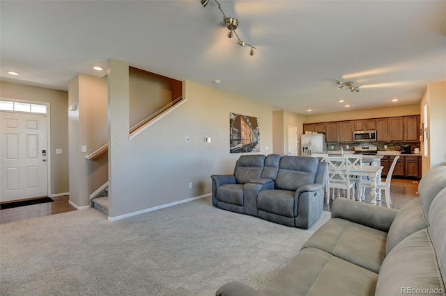 5837 High Timber Cir, Castle Rock, CO 80104 - living area featuring light carpet, baseboards, recessed lighting, and stairs