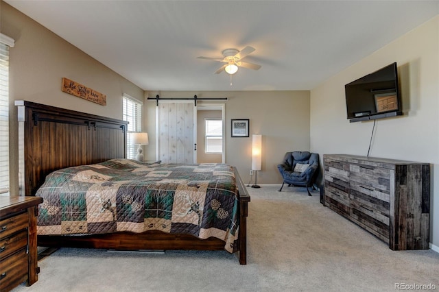 5837 High Timber Cir, Castle Rock, CO 80104 - bedroom featuring a barn door, baseboards, carpet flooring, and ceiling fan