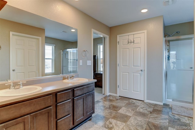 5837 High Timber Cir, Castle Rock, CO 80104 - full bathroom featuring double vanity, a shower stall, baseboards, and a sink