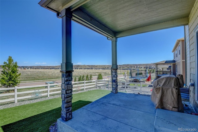 5837 High Timber Cir, Castle Rock, CO 80104 - view of patio featuring fence and a rural view