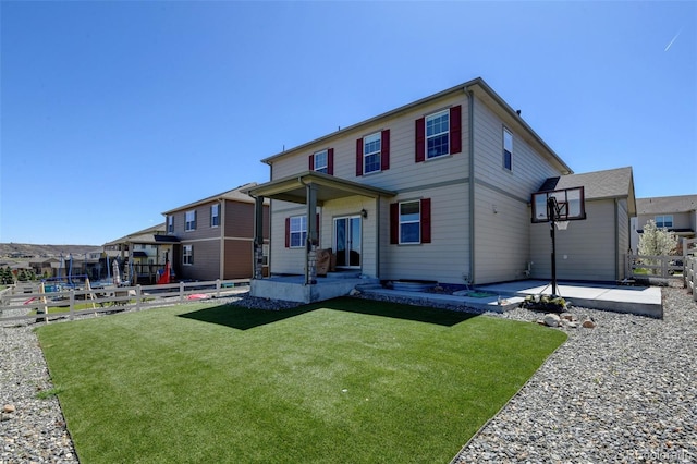 5837 High Timber Cir, Castle Rock, CO 80104 - view of front of home featuring a patio, a front yard, and fence