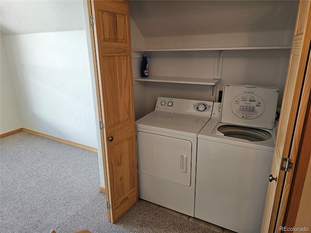 washroom with laundry area, separate washer and dryer, carpet, and baseboards