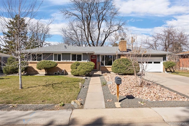 ranch-style house with brick siding, an attached garage, a front lawn, a chimney, and driveway