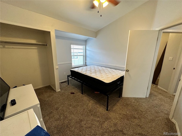 bedroom featuring a ceiling fan, a closet, carpet flooring, and vaulted ceiling