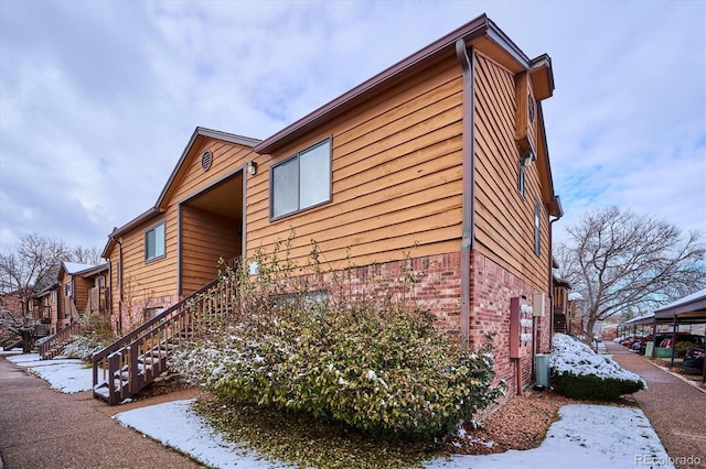 view of snow covered property