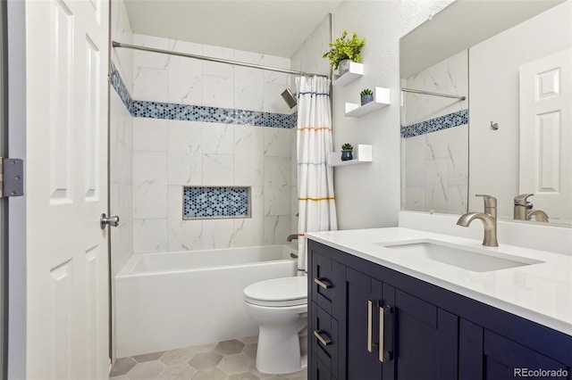 full bath featuring shower / bath combo with shower curtain, vanity, and toilet