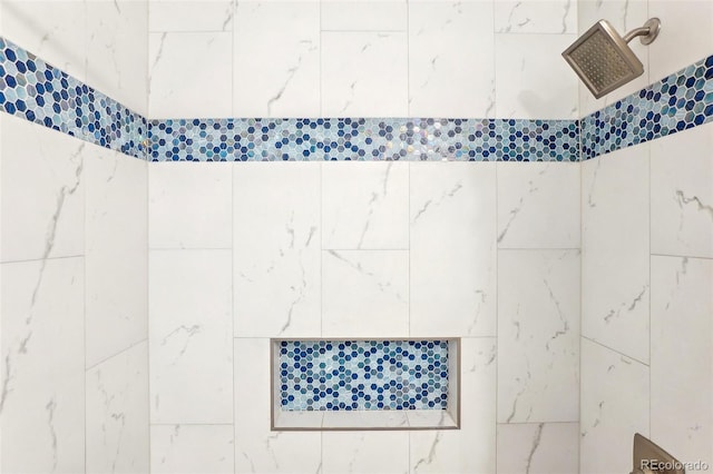 bathroom view of tiled shower