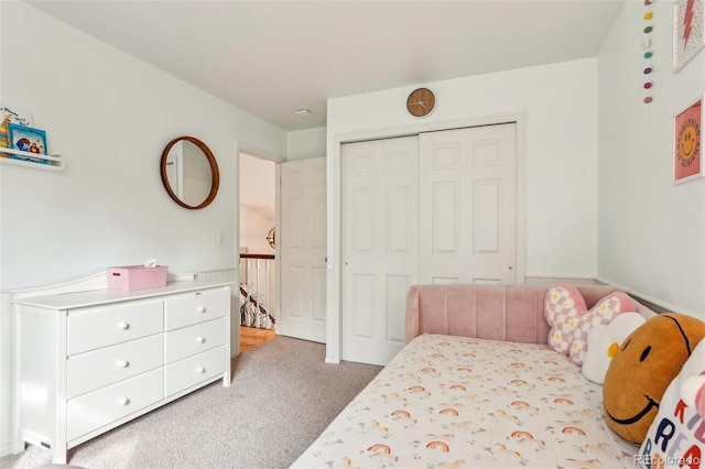bedroom featuring carpet floors and a closet