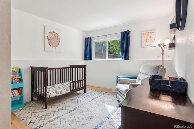 bedroom featuring wood finished floors