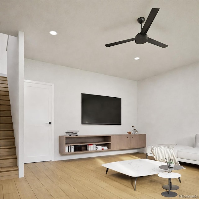 living room with a ceiling fan, recessed lighting, stairway, and wood finished floors