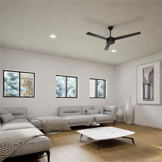 living room featuring recessed lighting, wood finished floors, and ceiling fan