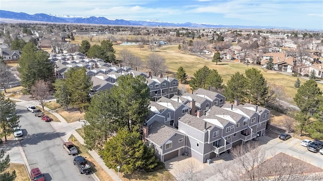 aerial view with a mountain view and a residential view