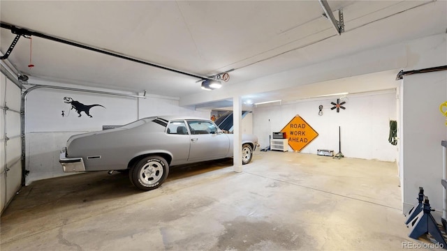 garage featuring a garage door opener