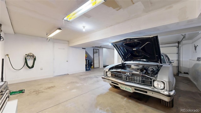 garage with baseboards