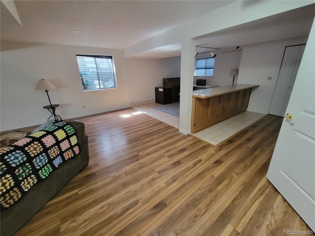 2619 S Iris Ct, Lakewood, CO 80227 - unfurnished living room with light wood finished floors