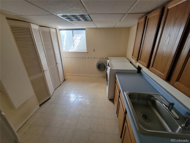 2619 S Iris Ct, Lakewood, CO 80227 - laundry area with baseboards and light flooring