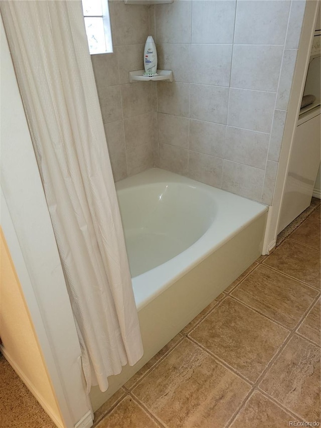 2619 S Iris Ct, Lakewood, CO 80227 - full bathroom featuring a tub, a shower with curtain, and tile patterned flooring