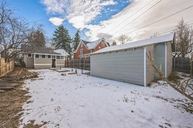 view of snow covered garage