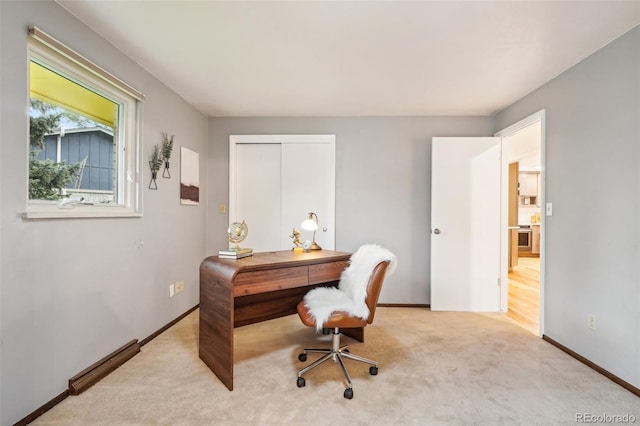 office area with carpet and baseboards