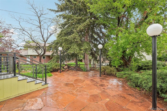 view of patio with stairway