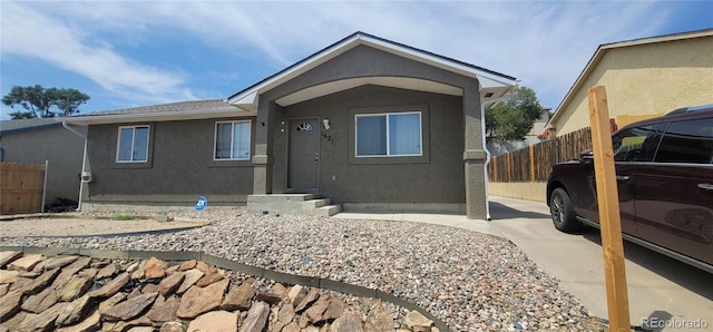 view of front of property with a carport