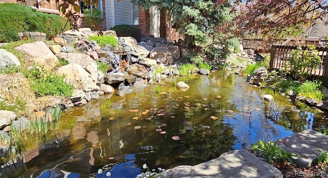 13894 E Lehigh Ave Unit G, Aurora, CO 80014 - exterior view of a garden pond