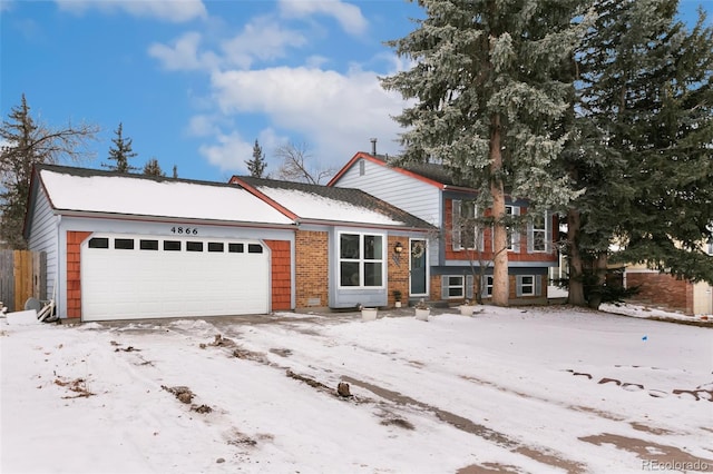 split level home featuring a garage