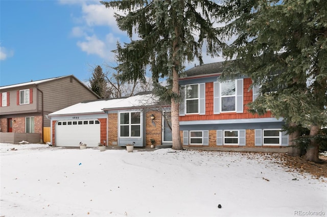 split level home featuring a garage