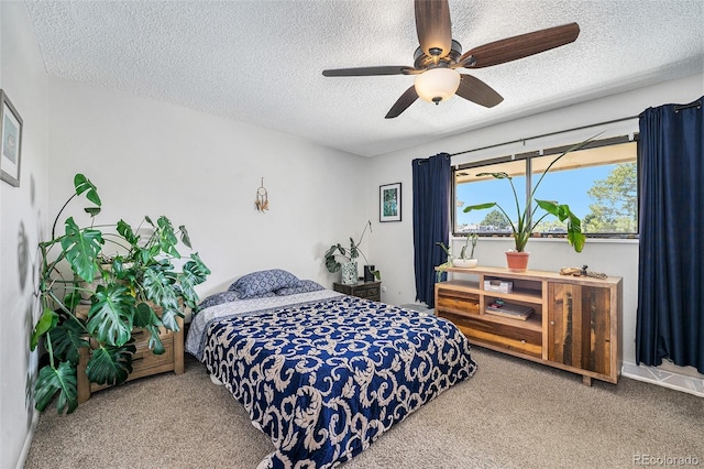 8666 Mariposa St, Thornton, CO 80260 - bedroom featuring a textured ceiling, carpet floors, and a ceiling fan