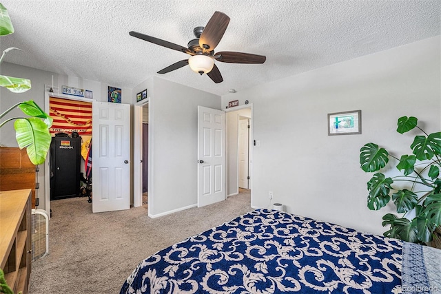 8666 Mariposa St, Thornton, CO 80260 - bedroom with a closet, a textured ceiling, ceiling fan, carpet floors, and a walk in closet