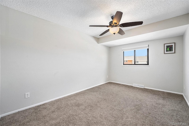 8666 Mariposa St, Thornton, CO 80260 - empty room with a ceiling fan, a textured ceiling, baseboards, carpet flooring, and visible vents