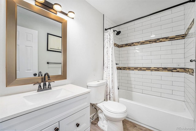 8666 Mariposa St, Thornton, CO 80260 - bathroom featuring vanity, toilet, shower / bath combo with shower curtain, and wood finished floors