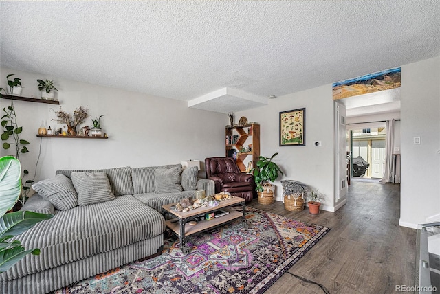 8666 Mariposa St, Thornton, CO 80260 - living area featuring baseboards, a textured ceiling, and wood finished floors