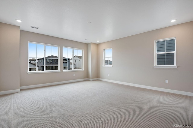 view of carpeted spare room