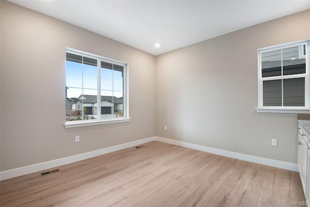 empty room featuring light hardwood / wood-style flooring