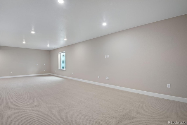 empty room with light colored carpet