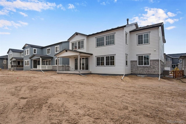 rear view of house with a patio area