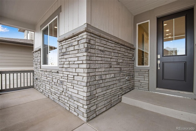 entrance to property with a porch