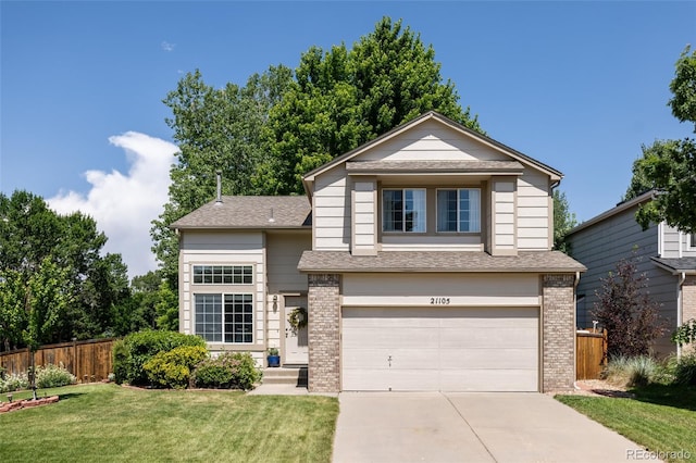 21105 Willow Park Pl, Parker, CO 80138 - view of front facade with a garage, brick siding, concrete driveway, and roof with shingles