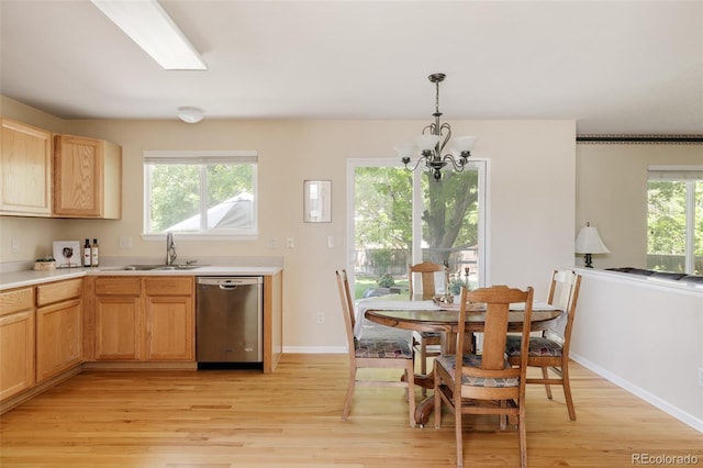 21105 Willow Park Pl, Parker, CO 80138 - kitchen featuring dishwasher, light wood-type flooring, and light countertops