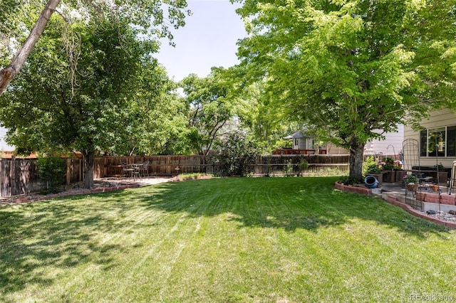21105 Willow Park Pl, Parker, CO 80138 - fenced backyard featuring a patio area