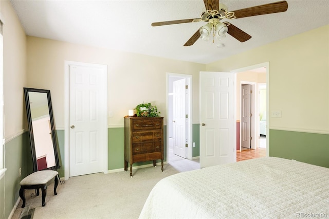 21105 Willow Park Pl, Parker, CO 80138 - bedroom featuring light carpet and ceiling fan
