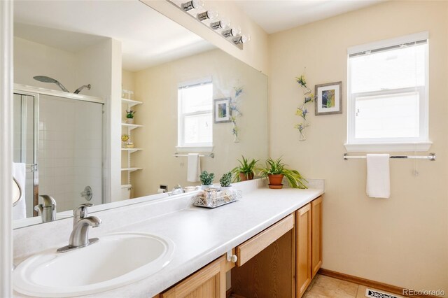 21105 Willow Park Pl, Parker, CO 80138 - bathroom with vanity, a shower stall, and tile patterned floors