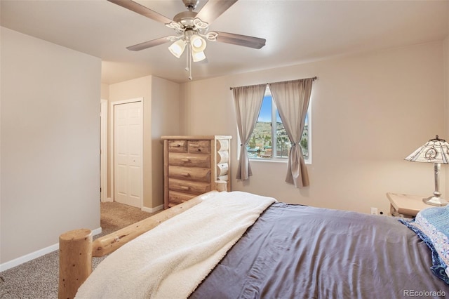 bedroom with ceiling fan, a closet, and light carpet