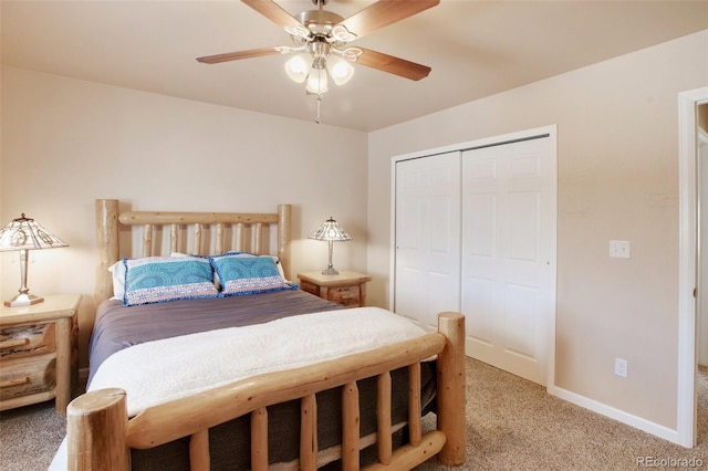 bedroom with ceiling fan, a closet, and light carpet