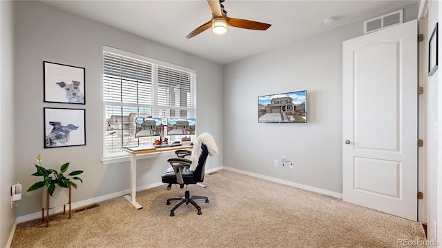 office with ceiling fan and light colored carpet