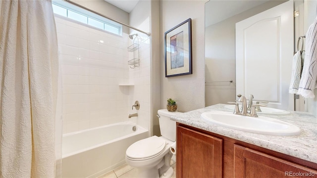 full bathroom featuring tile patterned floors, shower / bath combination with curtain, toilet, and vanity