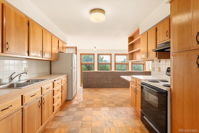 kitchen featuring backsplash, white appliances, sink, and light tile floors